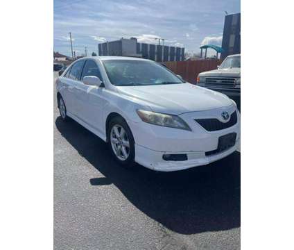 2009 Toyota Camry for sale is a White 2009 Toyota Camry Car for Sale in Lakewood CO