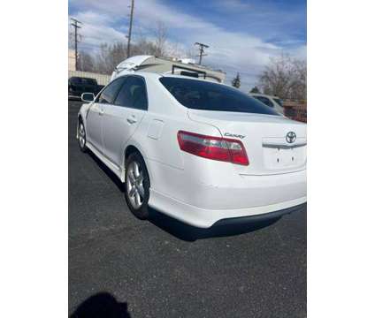 2009 Toyota Camry for sale is a White 2009 Toyota Camry Car for Sale in Lakewood CO