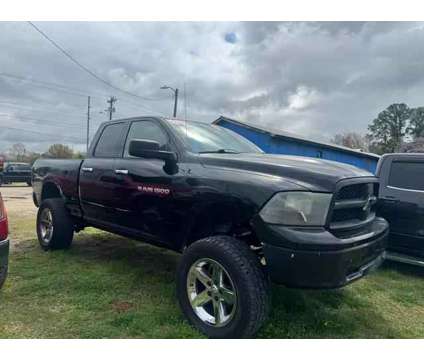 2012 Ram 1500 Quad Cab for sale is a Black 2012 RAM 1500 Model Car for Sale in Fayetteville NC