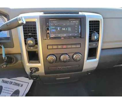 2012 Ram 1500 Quad Cab for sale is a Black 2012 RAM 1500 Model Car for Sale in Fayetteville NC