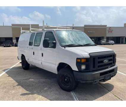 2012 Ford E150 Cargo for sale is a White 2012 Ford E150 Cargo Car for Sale in Houston TX