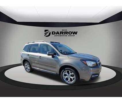 2017 Subaru Forester Touring is a Tan 2017 Subaru Forester 2.5i SUV in West Bend WI