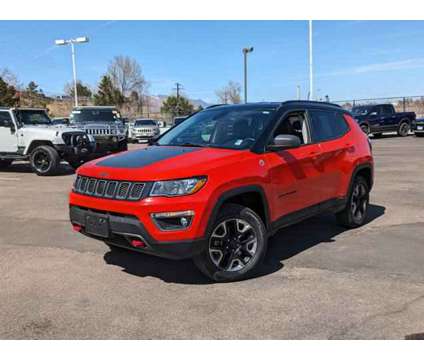 2017 Jeep Compass Trailhawk is a Orange 2017 Jeep Compass Trailhawk Car for Sale in Colorado Springs CO