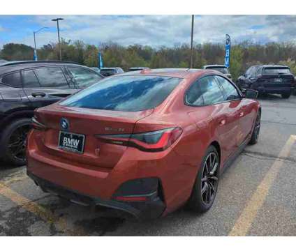 2024NewBMWNewi4NewGran Coupe is a Orange 2024 Coupe in Annapolis MD