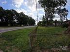 Gastonia, 3 Bedroom brick house sitting on commercial land