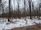 Farwell, Very nicely wooded .74 acres ready for you to set