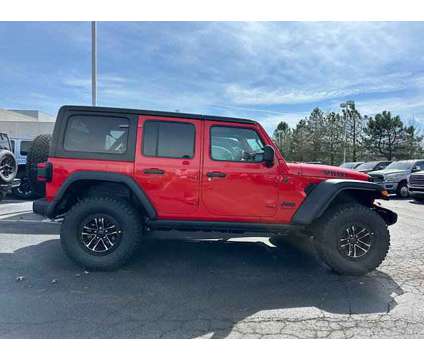 2024 Jeep Wrangler Willys is a Red 2024 Jeep Wrangler Car for Sale in Pataskala OH