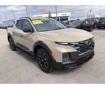 2024 Hyundai Santa Cruz XRT is a Tan 2024 Truck in Evansville IN