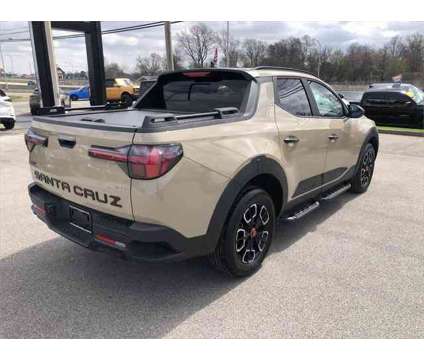 2024 Hyundai Santa Cruz XRT is a Tan 2024 Truck in Evansville IN