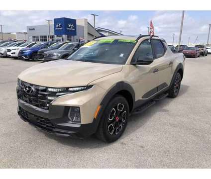 2024 Hyundai Santa Cruz XRT is a Tan 2024 Truck in Evansville IN