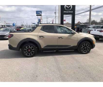 2024 Hyundai Santa Cruz XRT is a Tan 2024 Truck in Evansville IN