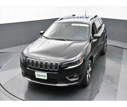 2021 Jeep Cherokee Limited 4X4 is a Black 2021 Jeep Cherokee Limited SUV in Dubuque IA