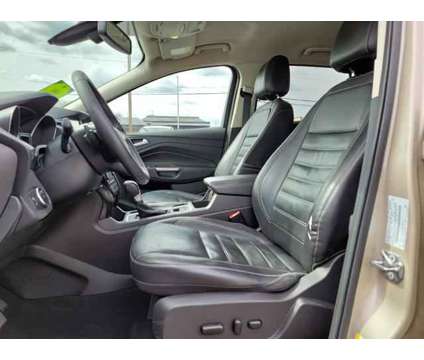 2017 Ford Escape Titanium is a Gold, White 2017 Ford Escape Titanium SUV in Philadelphia PA