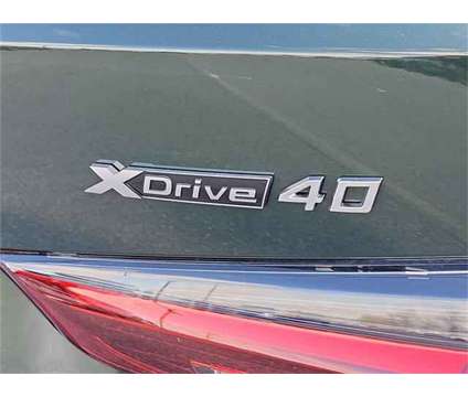 2024 BMW i4 xDrive40 is a Green 2024 Sedan in Milford DE