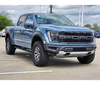 2023 Ford F-150 Raptor is a Blue, Grey 2023 Ford F-150 Raptor Truck in Katy TX