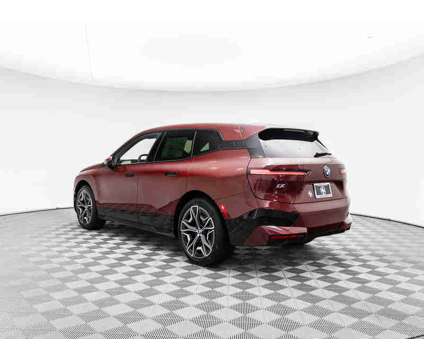 2024 BMW iX xDrive50 is a Red 2024 BMW 325 Model iX SUV in Barrington IL