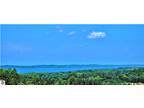 Alden, STUNNING Torch Lake Views from this 2.5 acre parcel