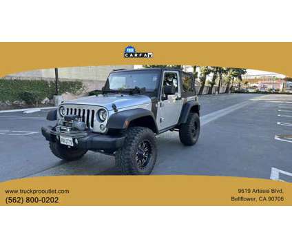 2015 Jeep Wrangler for sale is a Silver 2015 Jeep Wrangler Car for Sale in Bellflower CA