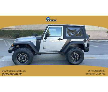 2015 Jeep Wrangler for sale is a Silver 2015 Jeep Wrangler Car for Sale in Bellflower CA