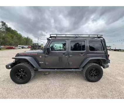 2017 Jeep Wrangler Unlimited for sale is a Grey 2017 Jeep Wrangler Unlimited Car for Sale in Porter TX