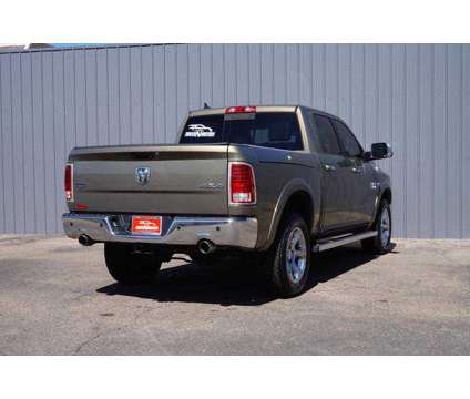 2013 Ram 1500 Crew Cab for sale is a Brown 2013 RAM 1500 Model Car for Sale in Greeley CO