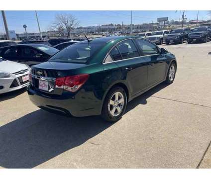2014 Chevrolet Cruze 1LT is a Green 2014 Chevrolet Cruze 1LT Car for Sale in Des Moines IA