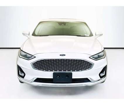 2020 Ford Fusion Energi Titanium is a Silver, White 2020 Ford Fusion Energi Titanium Sedan in Montclair CA