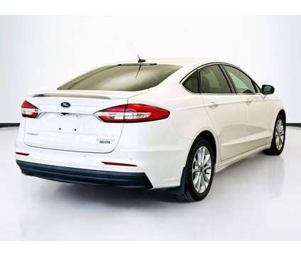 2020 Ford Fusion Energi Titanium is a Silver, White 2020 Ford Fusion Energi Titanium Sedan in Montclair CA