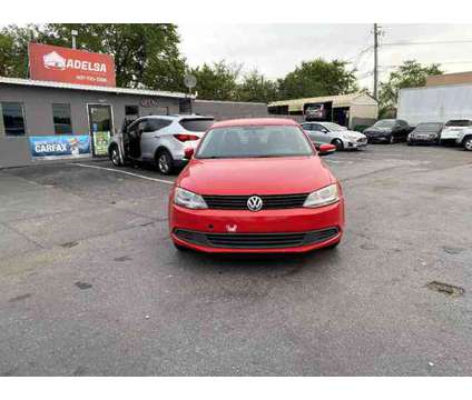 2014 Volkswagen Jetta for sale is a Red 2014 Volkswagen Jetta 2.5 Trim Car for Sale in Orlando FL