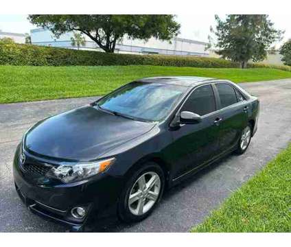 2014 Toyota Camry for sale is a Green 2014 Toyota Camry Car for Sale in North Lauderdale FL