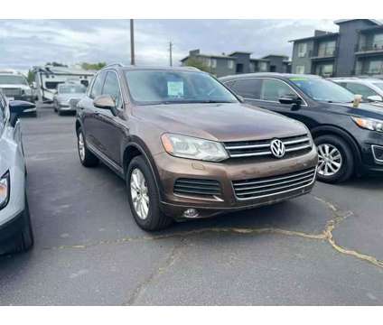 2014 Volkswagen Touareg for sale is a Brown 2014 Volkswagen Touareg Car for Sale in Redmond OR