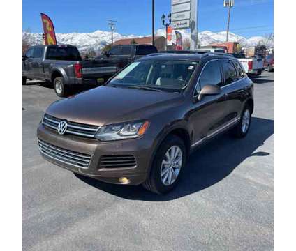 2014 Volkswagen Touareg for sale is a Brown 2014 Volkswagen Touareg Car for Sale in Redmond OR