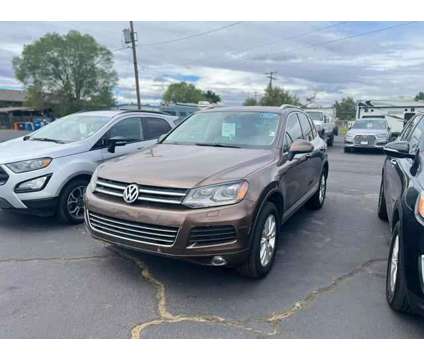 2014 Volkswagen Touareg for sale is a Brown 2014 Volkswagen Touareg Car for Sale in Redmond OR