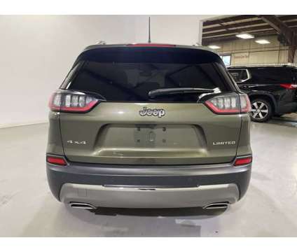 2021 Jeep Cherokee Limited is a Green 2021 Jeep Cherokee Car for Sale in Traverse City MI