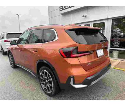 2023 BMW X1 xDrive28i is a Orange 2023 BMW X1 xDrive 28i SUV in Manchester NH