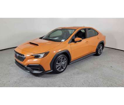 2024 Subaru WRX Base is a Orange 2024 Subaru WRX Base Sedan in Las Vegas NV