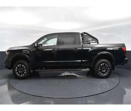 2024 Nissan Titan XD PRO-4X is a Black 2024 Nissan Titan XD PRO-4X Truck in Columbus GA