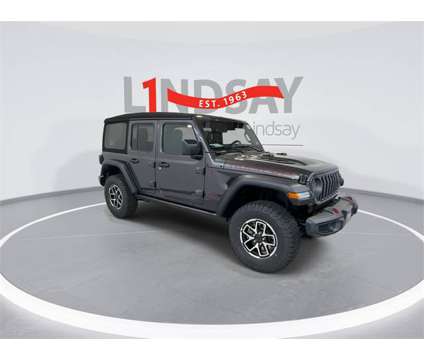 2024 Jeep Wrangler Rubicon is a Grey 2024 Jeep Wrangler Rubicon SUV in Manassas VA