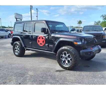 2022 Jeep Wrangler Unlimited Rubicon is a Black 2022 Jeep Wrangler Unlimited Rubicon SUV in Seffner FL