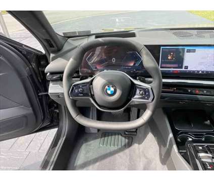 2024 BMW 5 Series i xDrive is a Grey 2024 BMW 5-Series Sedan in Mechanicsburg PA