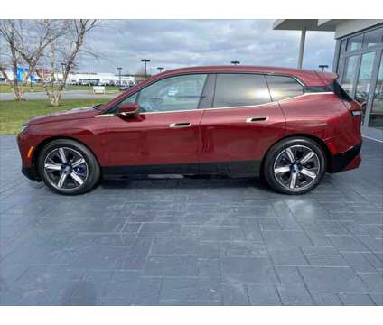 2024 BMW iX M60 is a Red 2024 BMW 325 Model iX SUV in Mechanicsburg PA