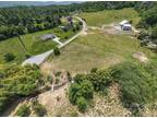 Hendersonville, Gorgeous level 3.58 acre mostly cleared