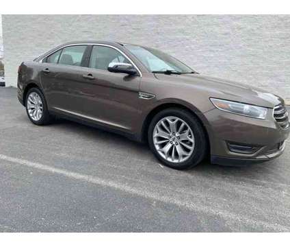 2015 Ford Taurus Limited is a Brown 2015 Ford Taurus Limited Sedan in Wake Forest NC