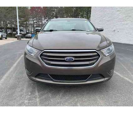 2015 Ford Taurus Limited is a Brown 2015 Ford Taurus Limited Sedan in Wake Forest NC