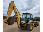 1997 New Holland 575E backhoe