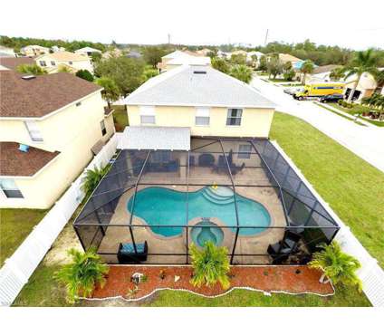 Amazing Pool Home! Great Location, Great Price at 11528 Clumbet Lane, Lehigh Acres, Fl in Lehigh Acres FL is a Single-Family Home