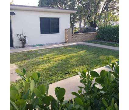Free Moving Month-100% Renovated Gorgeous 3/2 House at 803 Ne 8th St in Hallandale FL is a Home