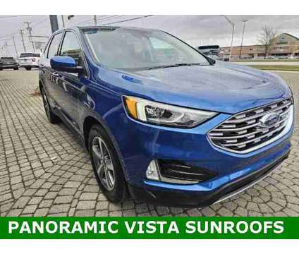 2021 Ford Edge SEL AWD is a Blue 2021 Ford Edge SEL SUV in Bowling Green OH