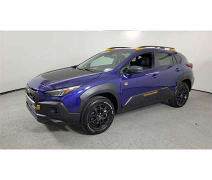 2024 Subaru Crosstrek Wilderness is a Blue 2024 Subaru Crosstrek 2.0i SUV in Las Vegas NV