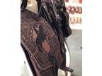 Excellent western leather saddle for riders of all classes